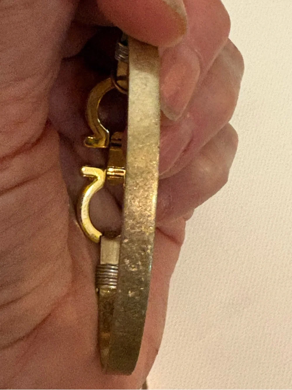 Authentic Salvatore Ferragamo charm set on unbranded bangle bracelet
